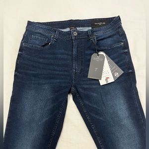 Brand new perfect jean NWT. Slim fit size 34W x 34L. Color Knight-Dark Blue